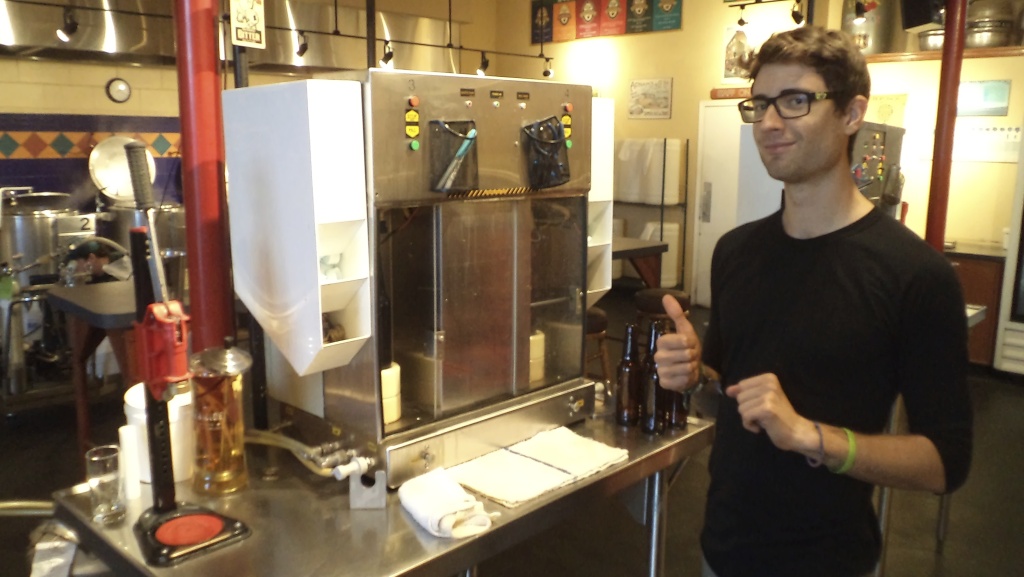 Spencer gives us a thumbs up at the filling machine.